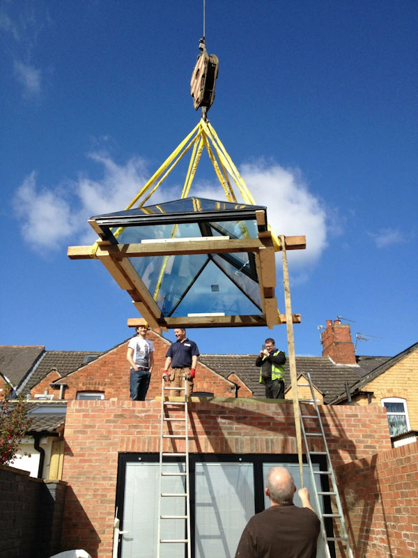 Slimline roof lantern being lifted onto roof
