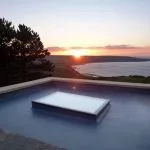 fixed flat roof window at sunset