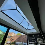 Looking up through roof lantern to blue sky