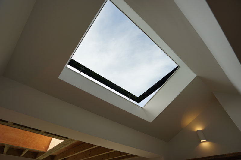 Opening pitched roof window