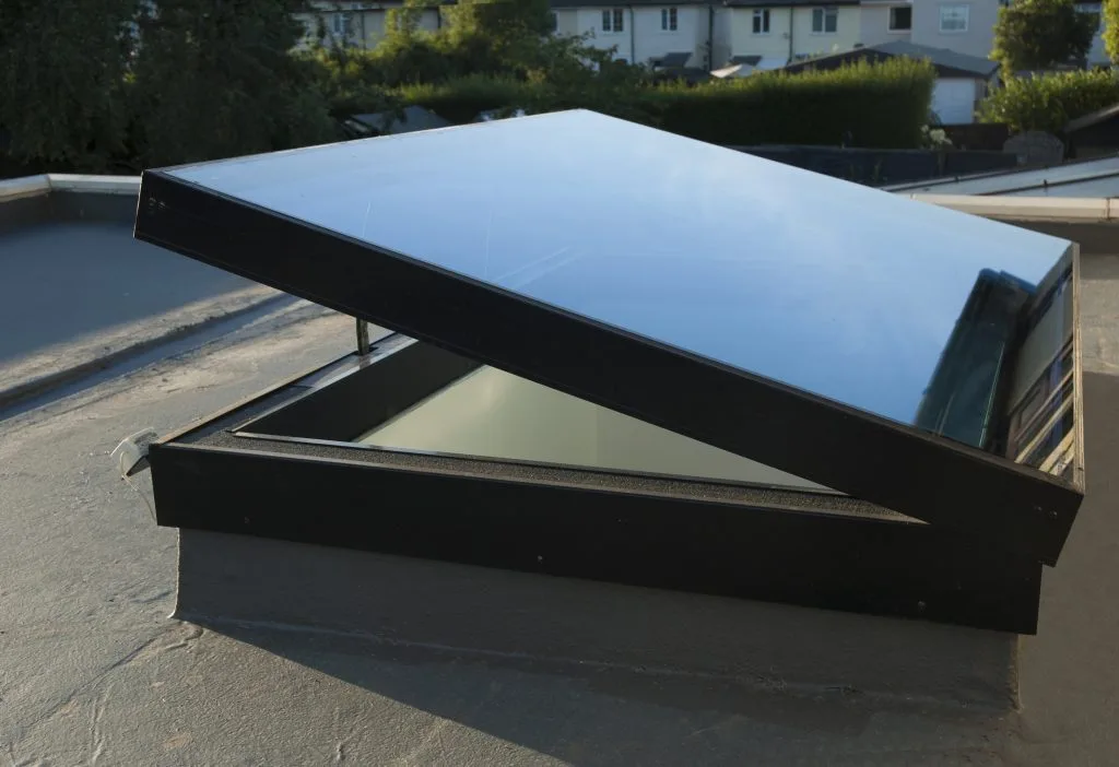 Opening hinged rooflight