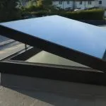 Opening hinged rooflight