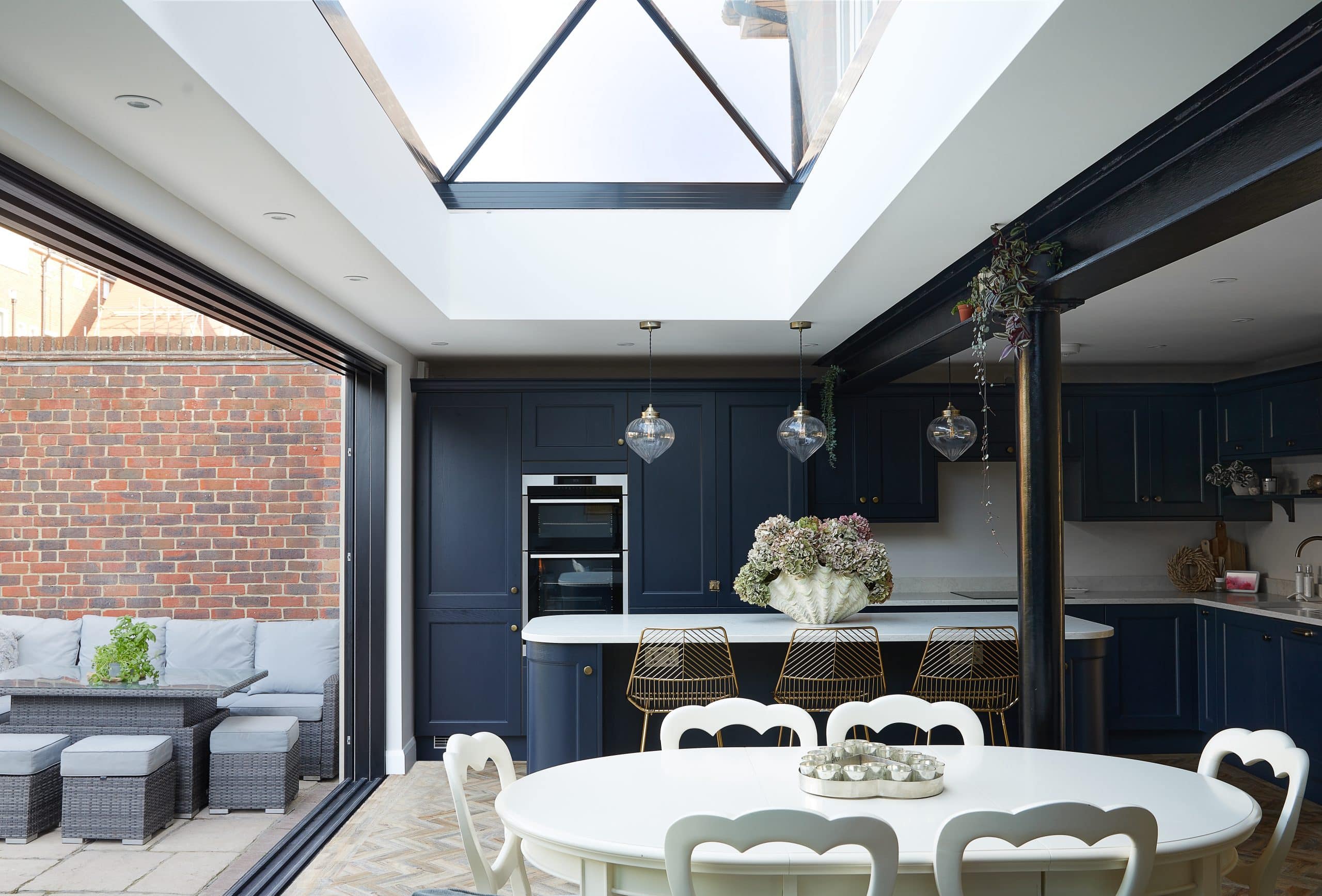 Large slimline lantern installed above kitchen dining area