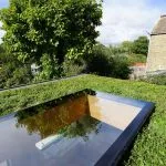 Flat rooflight on living green roof