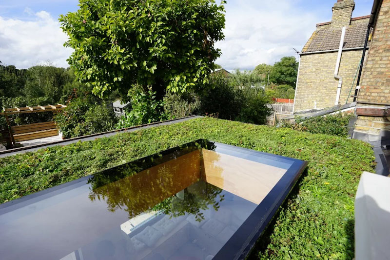 Flat rooflight on living green roof