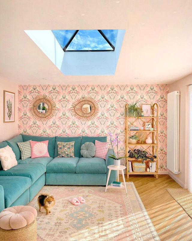 Slimline lantern above pink and green decorated living area
