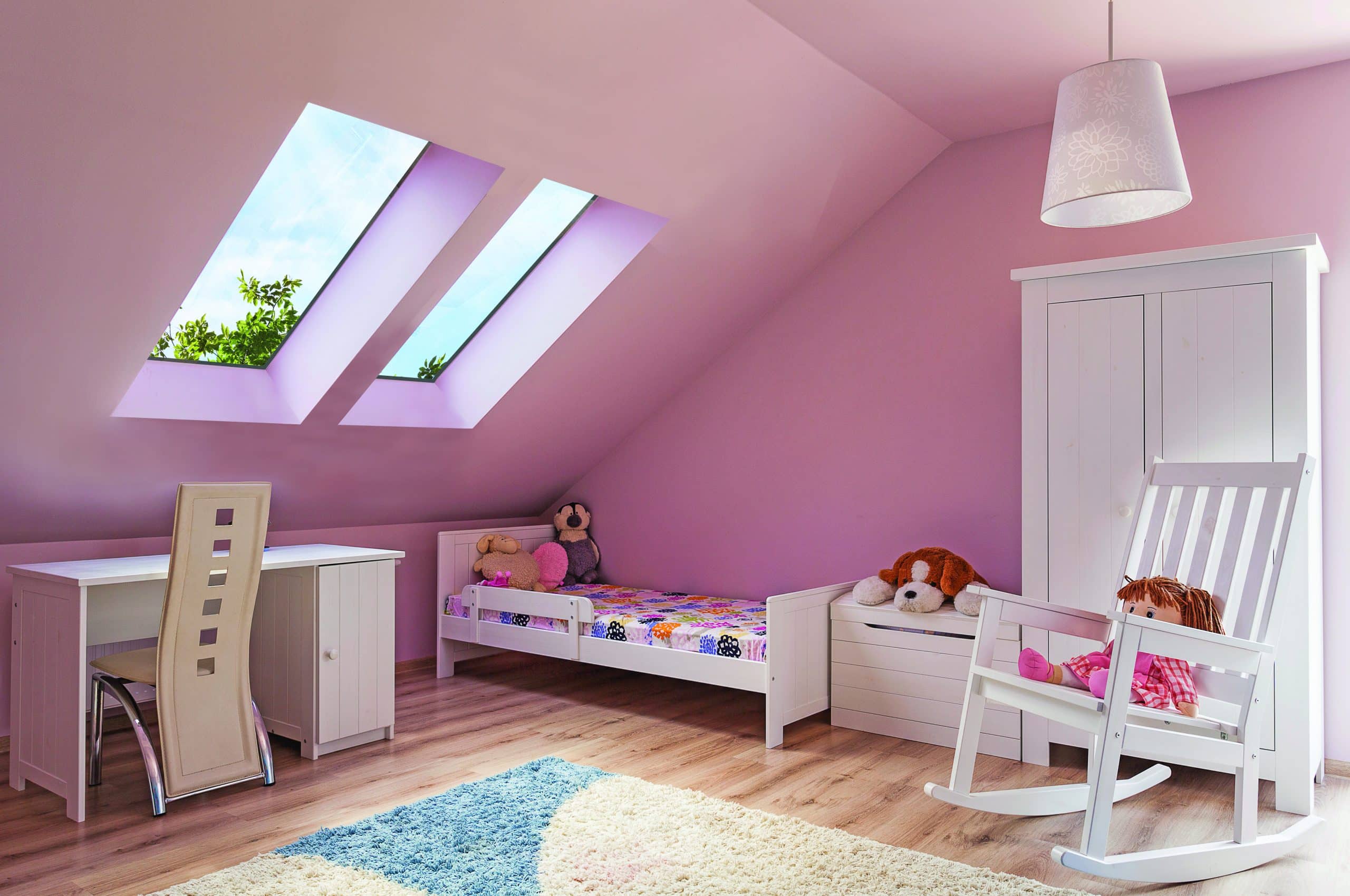 Pink room with pitched rooflights