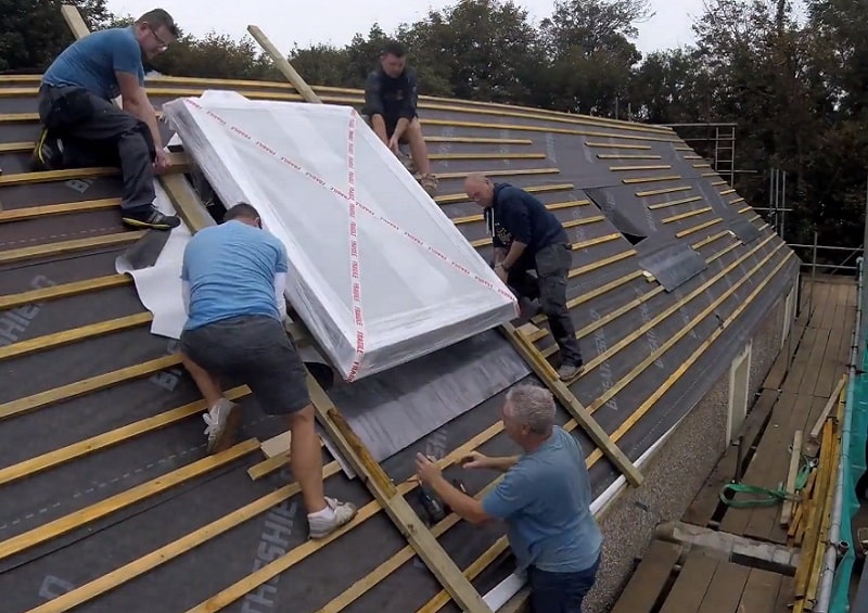 Pitched window being installed