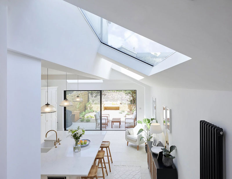 Large Luxlite pitched skylight above dining area