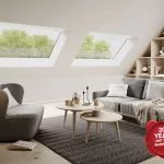 Cosy modern living area, with large pitched rooflights